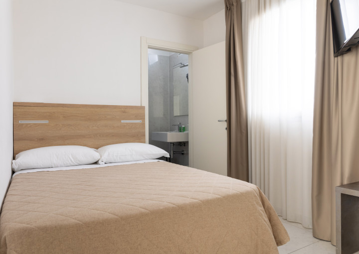 media.camera-singola-hotel-ducale-letto-francese